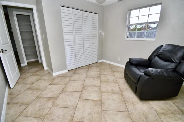 an aerial view of a house with a garden