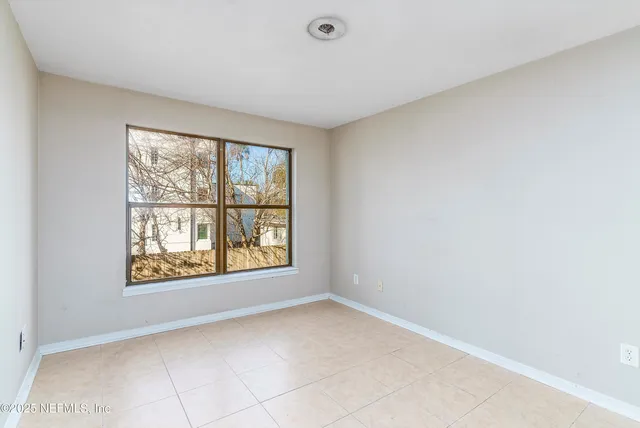 an empty room with windows