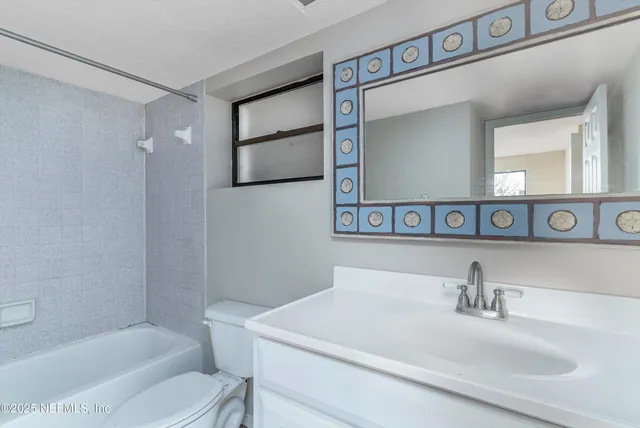 a bathroom with a sink and a bathtub