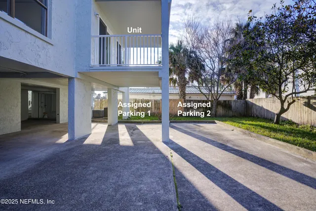a view of a hallway with entryway door