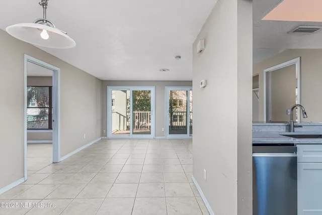 a view of livingroom with kitchen