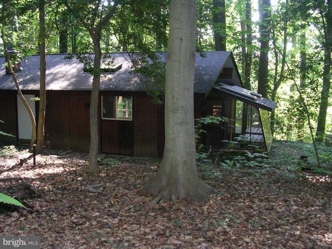 2704 Hidden Valley Road Accokeek, MD 20607 - Photo 2 of 15 a view of a house with a yard