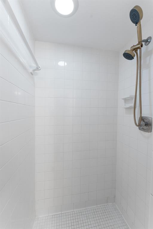 219 Cypress Court, Unit 219 Oldsmar, FL 34677 - Photo 20 of 34 a bathroom with a shower