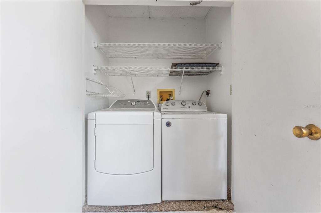 219 Cypress Court, Unit 219 Oldsmar, FL 34677 - Photo 26 of 34 a utility room with dryer and washer