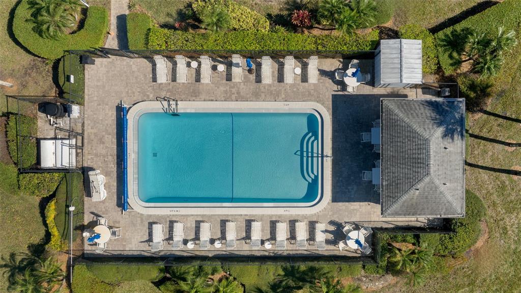 219 Cypress Court, Unit 219 Oldsmar, FL 34677 - Photo 5 of 34 a front view of a house with garden and patio