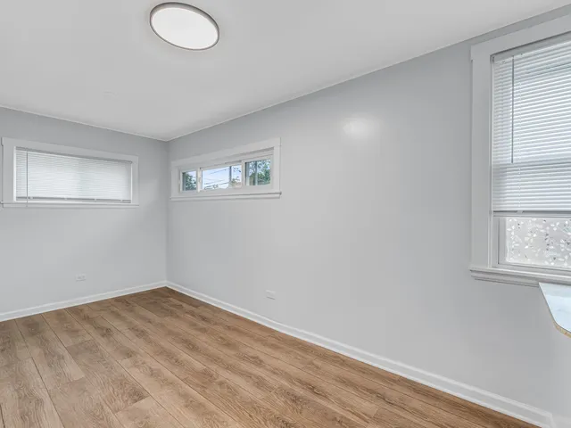 a view of a room that has a window in it