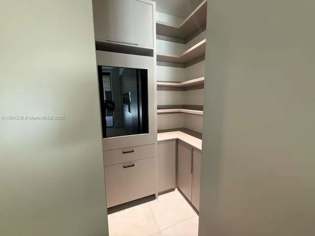 a outdoor living space with furniture and a potted plant