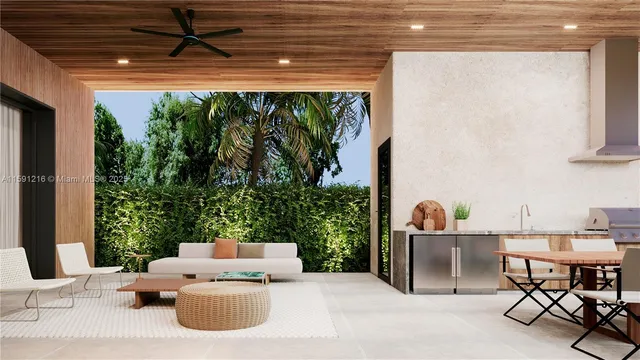 a view of a refrigerator in kitchen and an empty room