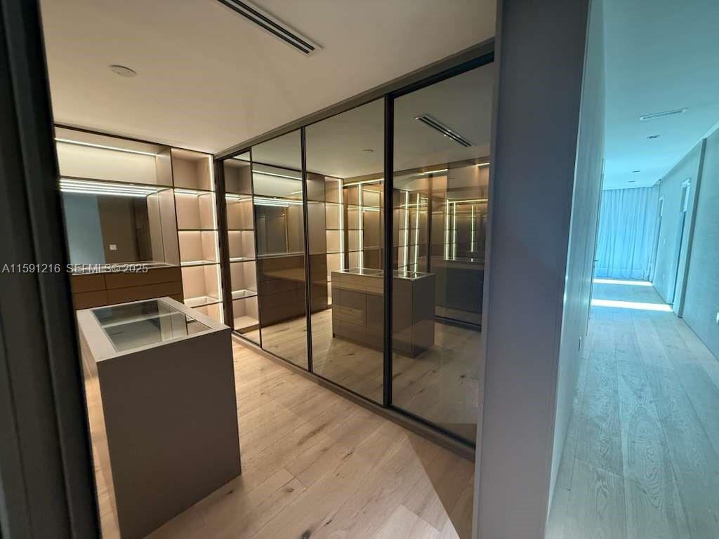 135 Southwest 29th Road Miami, FL 33129 - Photo 41 of 69 a view of a refrigerator in kitchen and an empty room