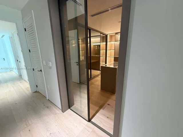 a bathroom with a toilet a sink and shower