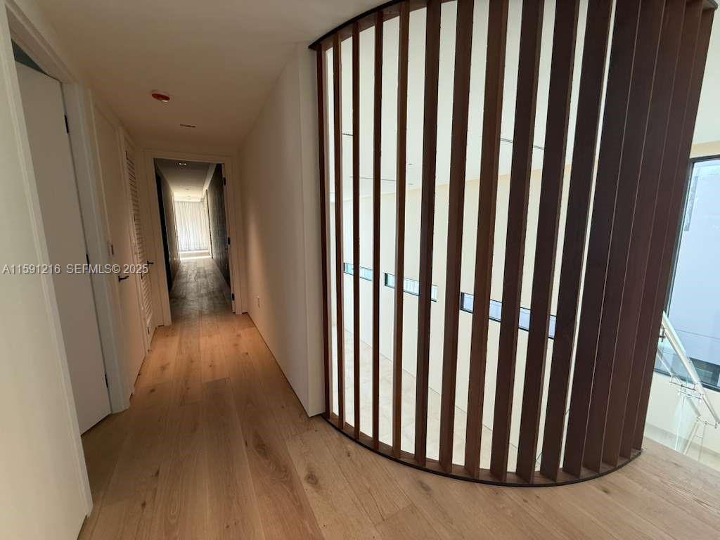 135 Southwest 29th Road Miami, FL 33129 - Photo 52 of 69 a view of a hallway with wooden floor
