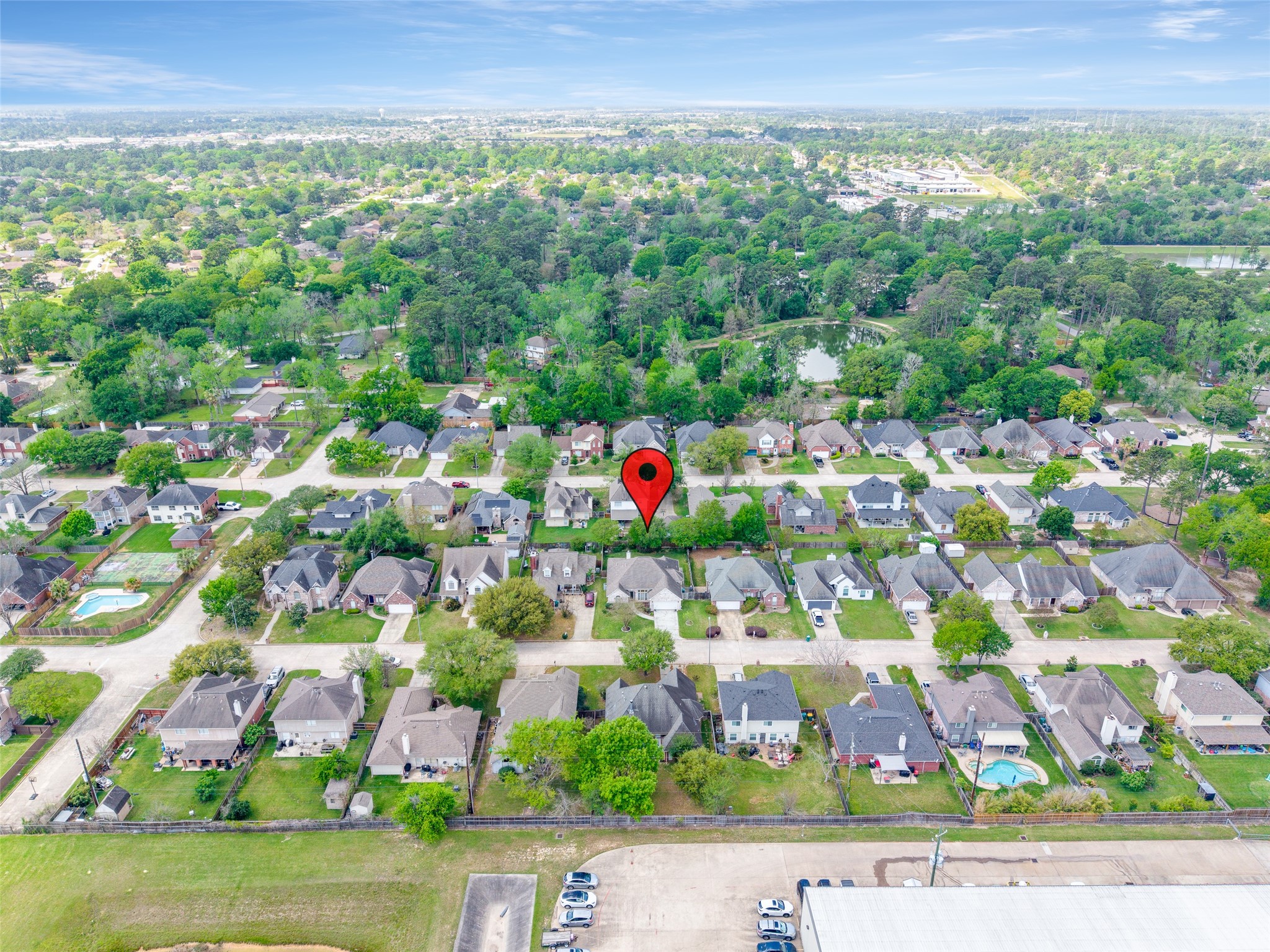 21719 Long Castle Drive Spring, TX 77388 - Photo 17 of 19 An aerial view showcases this beautiful home, highlighting its surrounding property for a complete perspective.