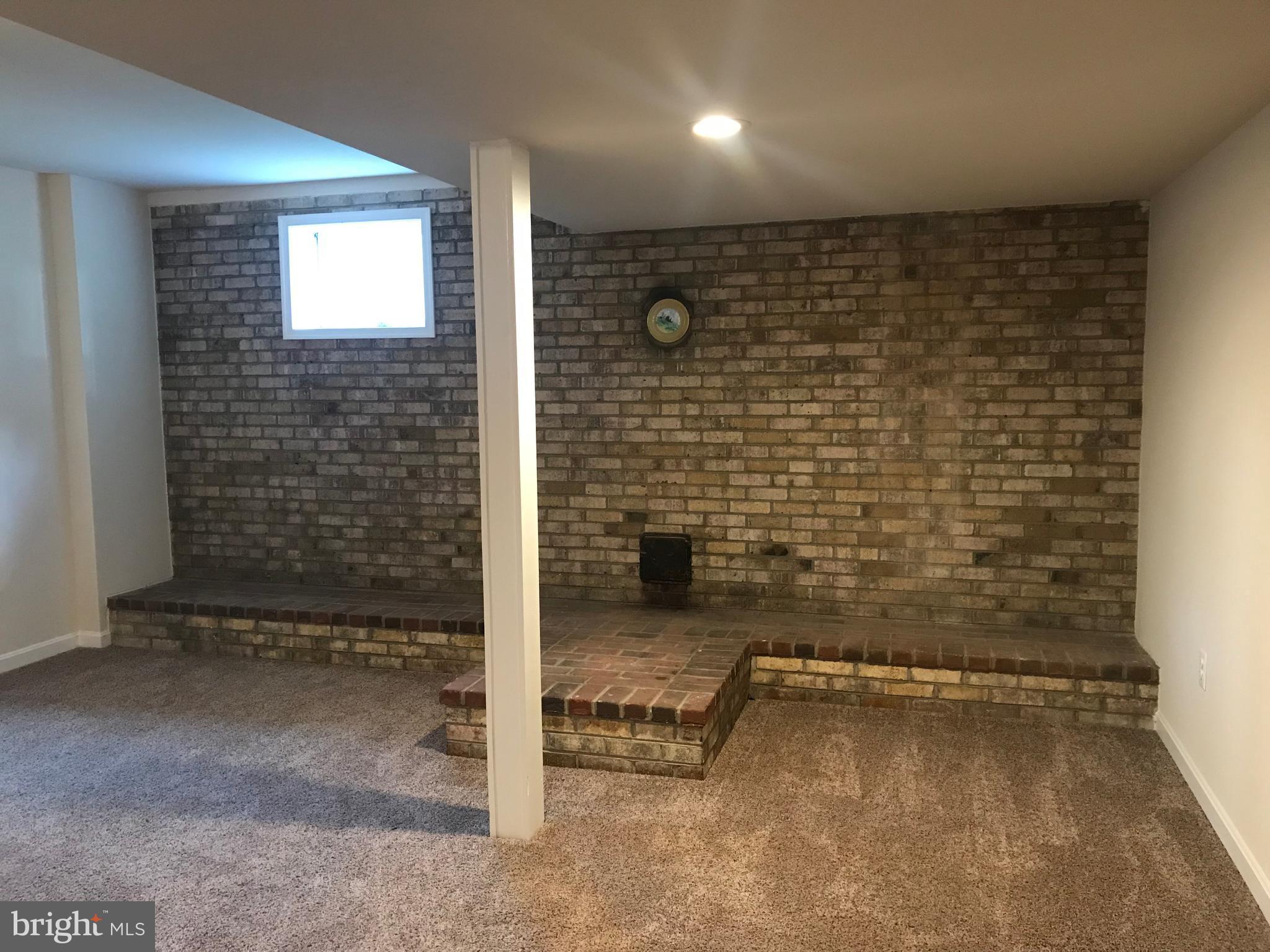7222 Wheeler Road Boonsboro, MD 21713 - Photo 21 of 27 FAMILY RM BRICK HEARTH FOR WOODSTOVE LOWER LEVEL