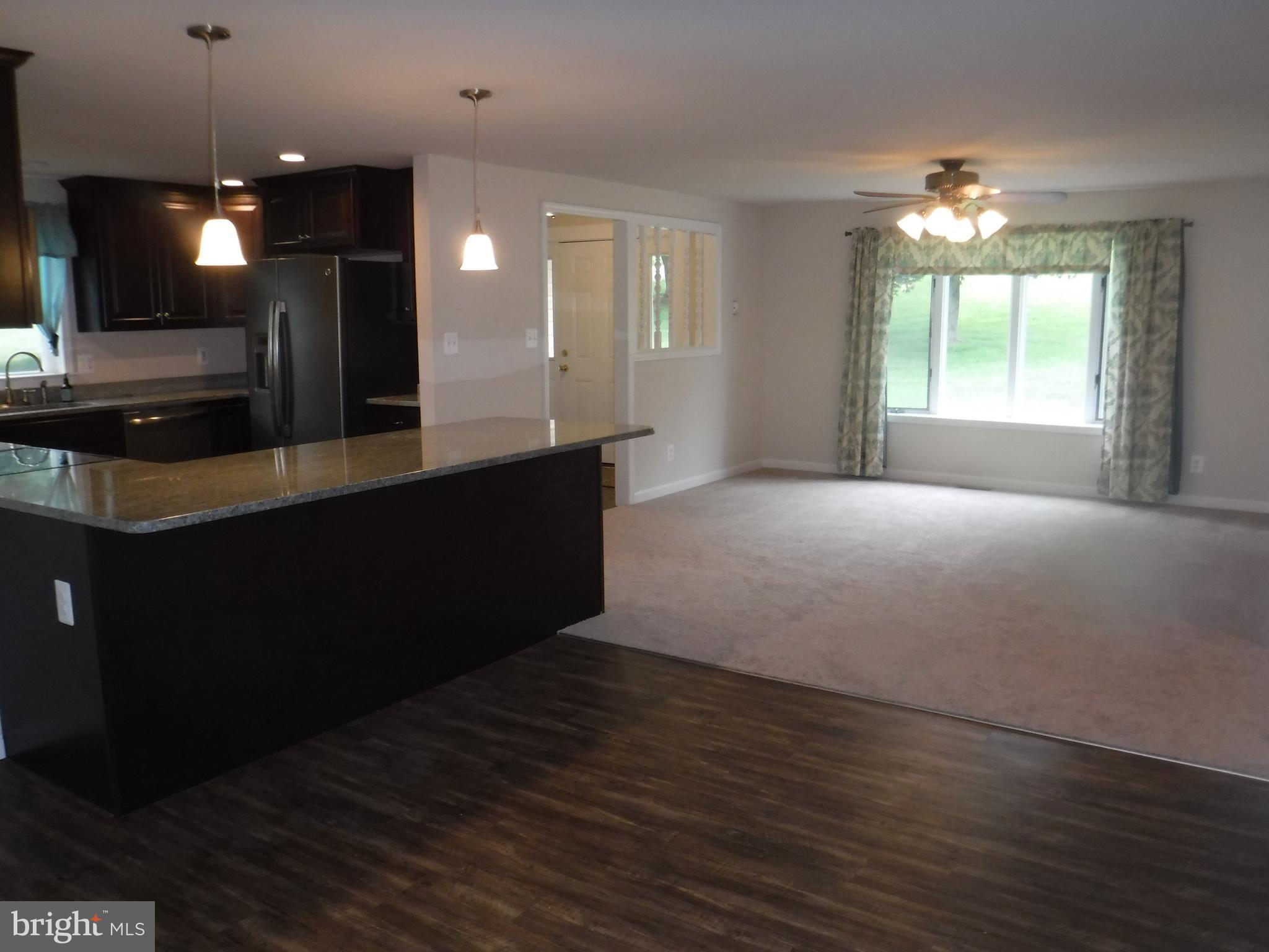 VIEW INTO GREAT ROOM W/PICTURE WINDOW