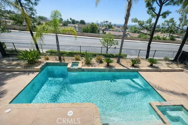 a view of a backyard of the house