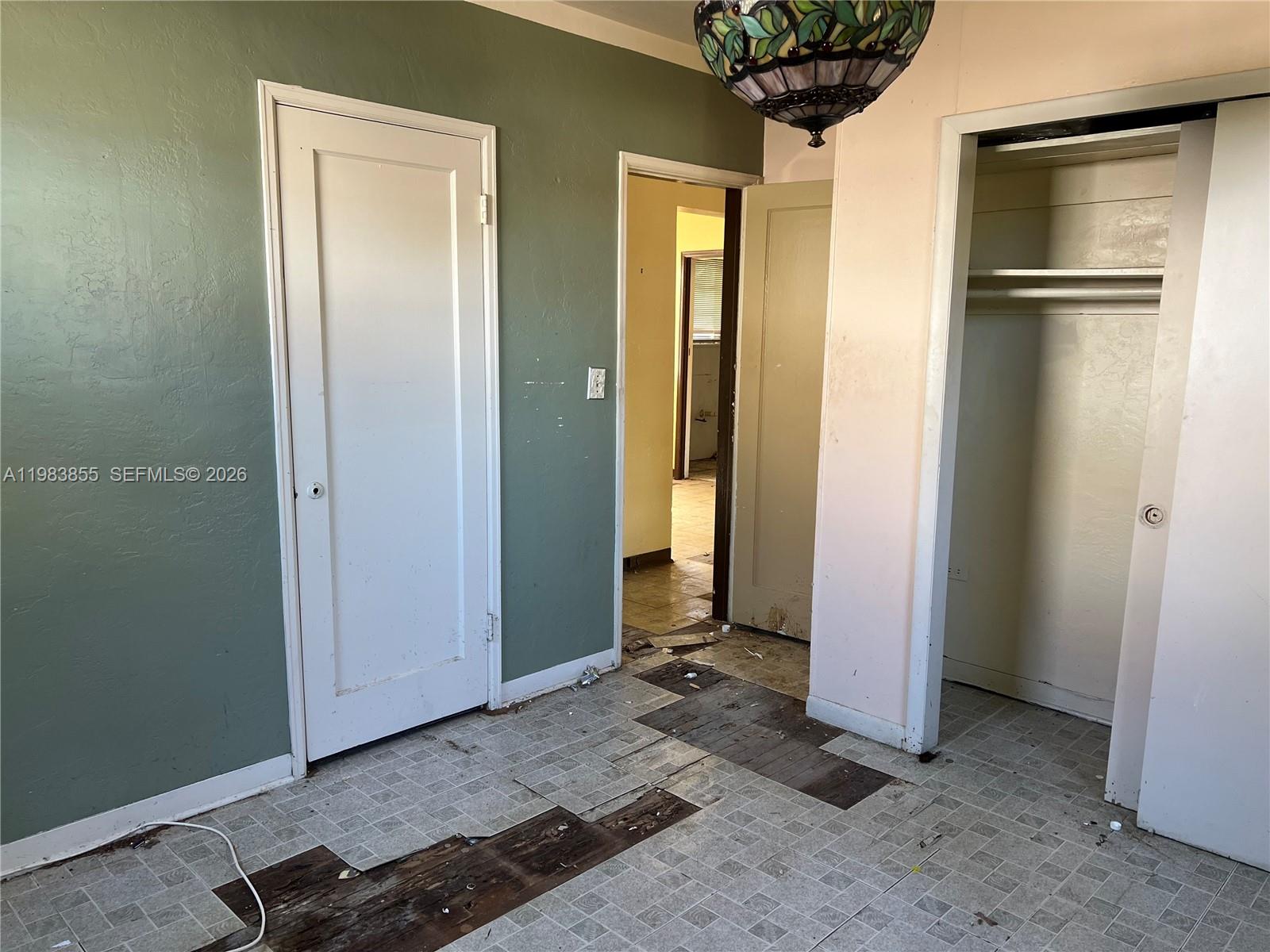 4420 Southwest 3rd Street Miami, FL 33134 - Photo 16 of 44 a view of a room with a wardrobe space and windows