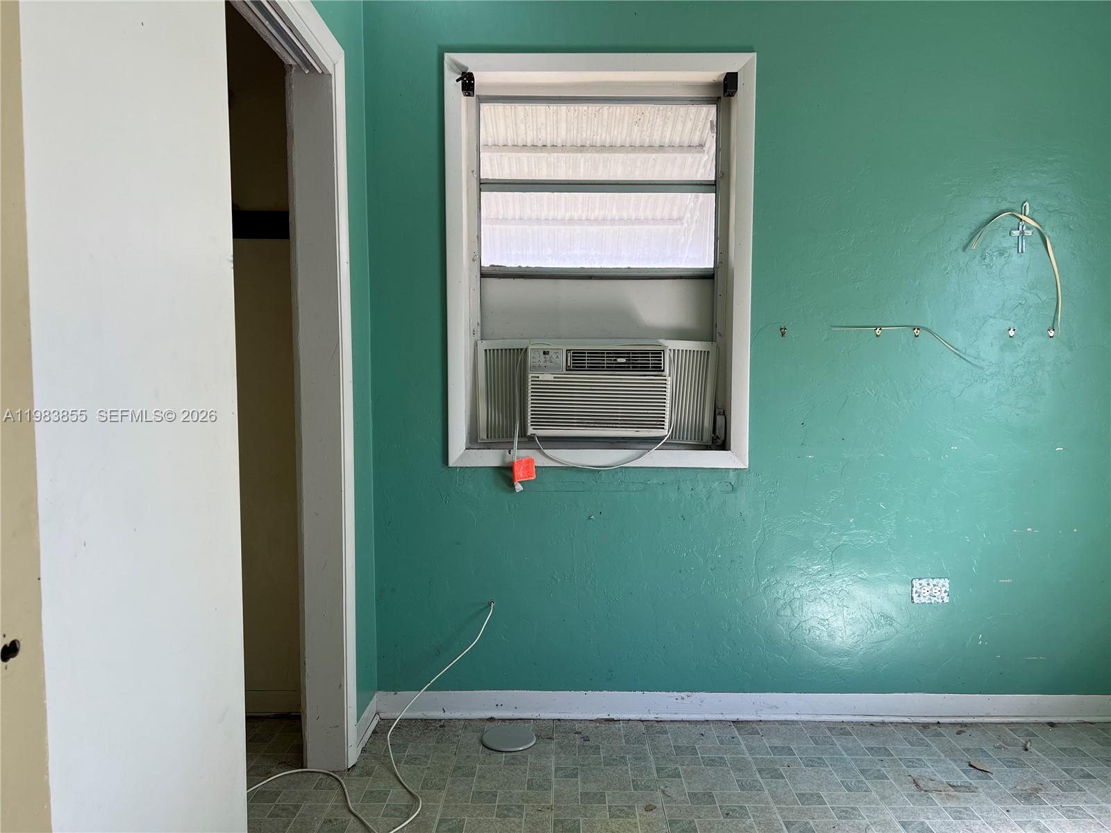 4420 Southwest 3rd Street Miami, FL 33134 - Photo 20 of 44 a room with washing machine and window