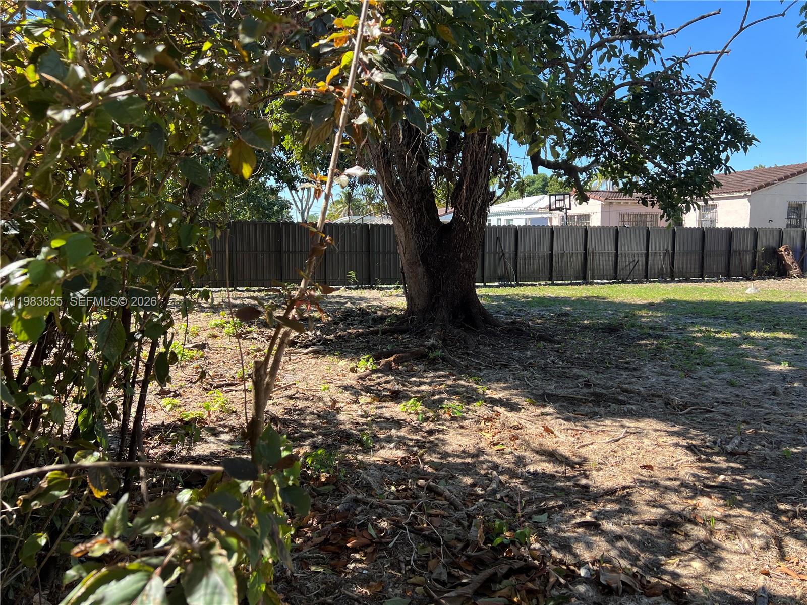 4420 Southwest 3rd Street Miami, FL 33134 - Photo 29 of 44 a backyard of a house with lots of green space
