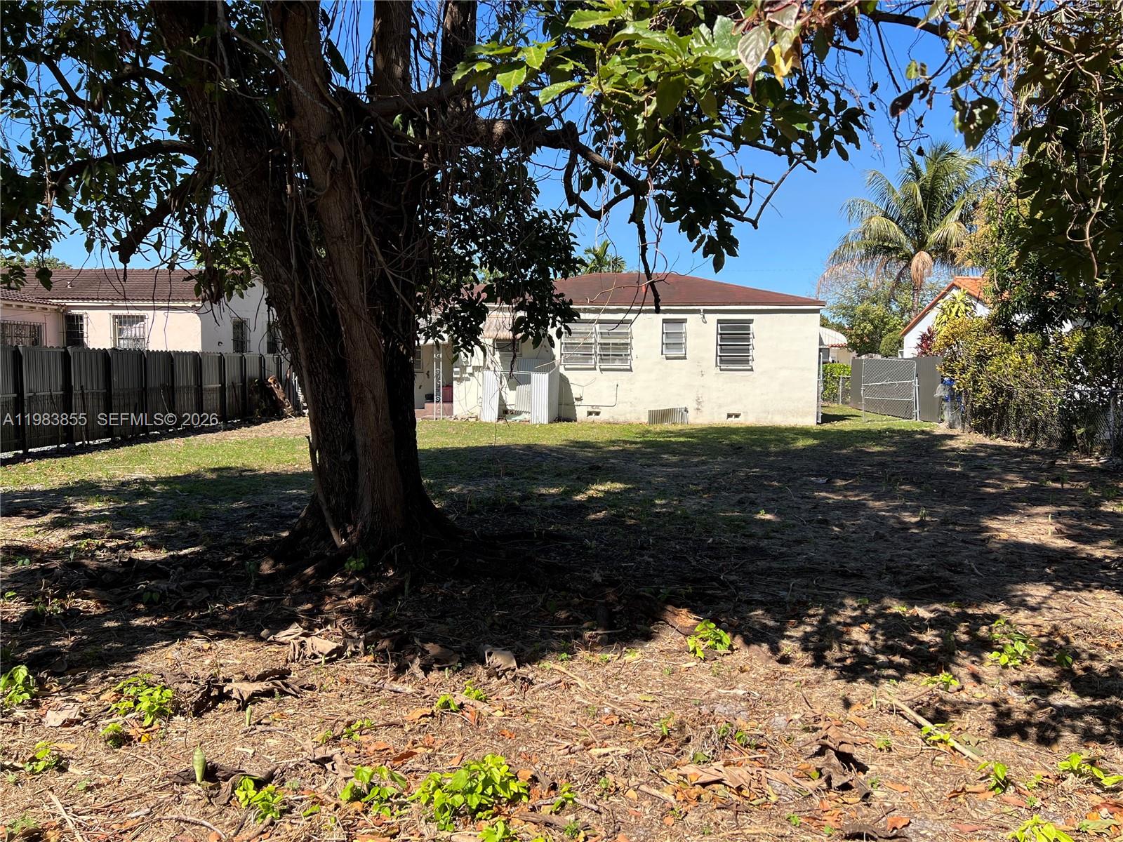 4420 Southwest 3rd Street Miami, FL 33134 - Photo 30 of 44 a view of a yard with a tree