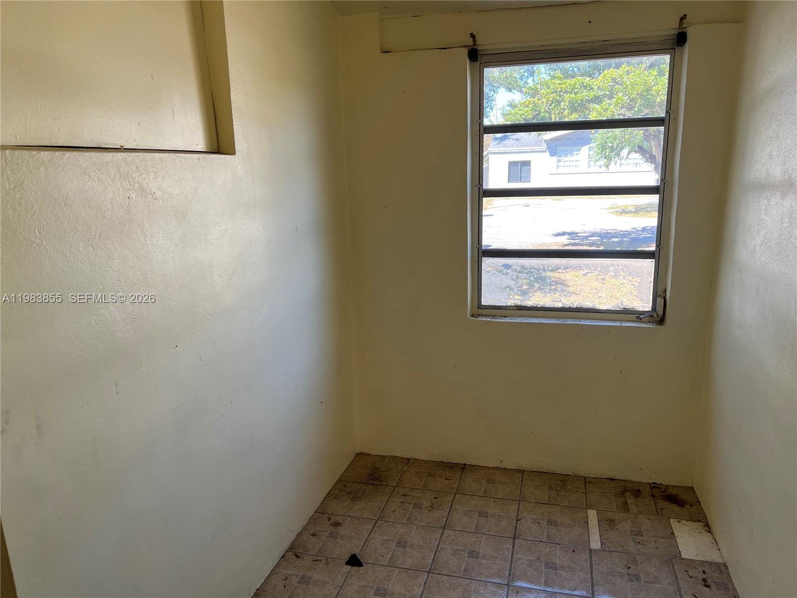4420 Southwest 3rd Street Miami, FL 33134 - Photo 7 of 44 a view of a small space with a window