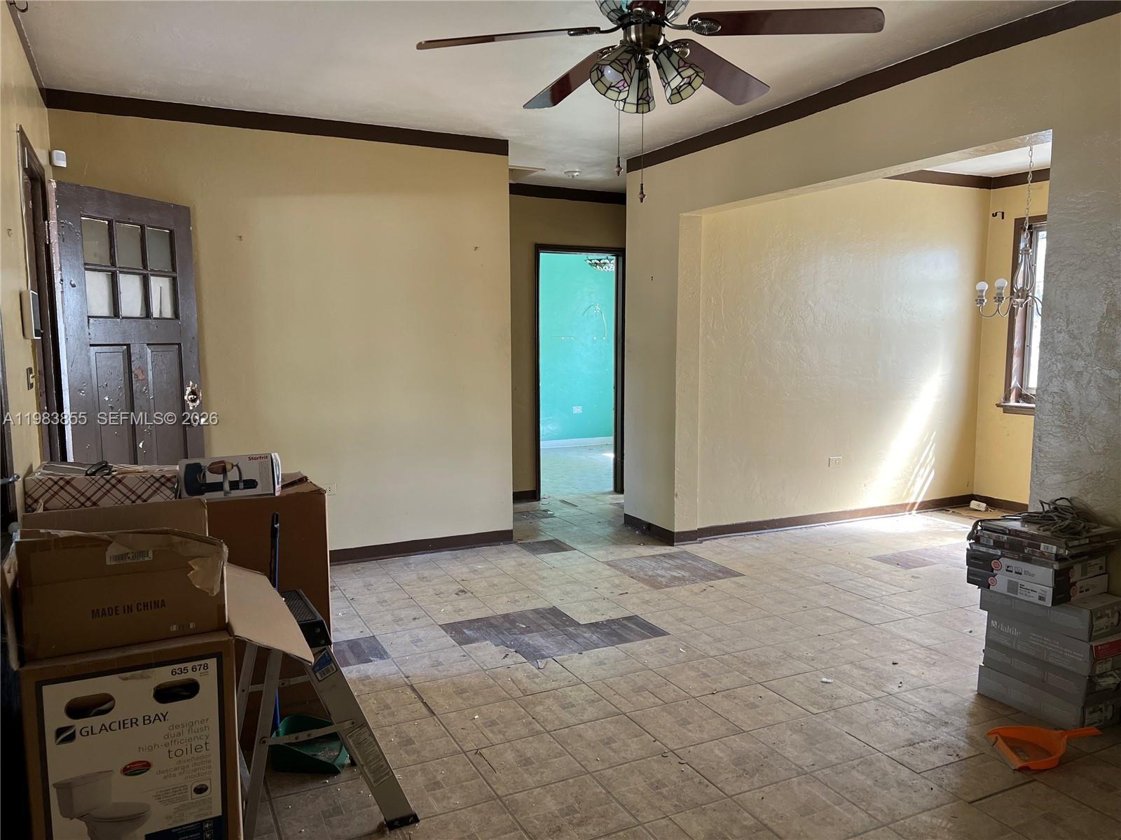 4420 Southwest 3rd Street Miami, FL 33134 - Photo 8 of 44 a view of a livingroom with furniture and an empty room