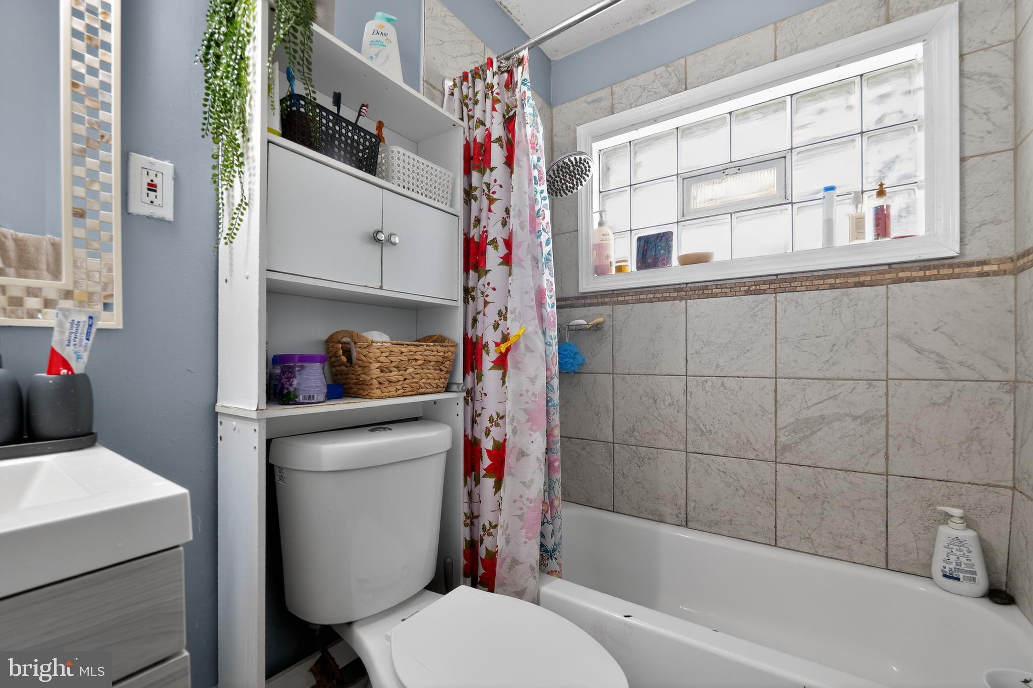 5909 Charnwood Road Catonsville, MD 21228 - Photo 24 of 31 Charming bathroom with natural light.