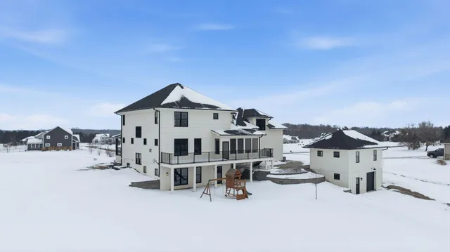 a view of roof with city view