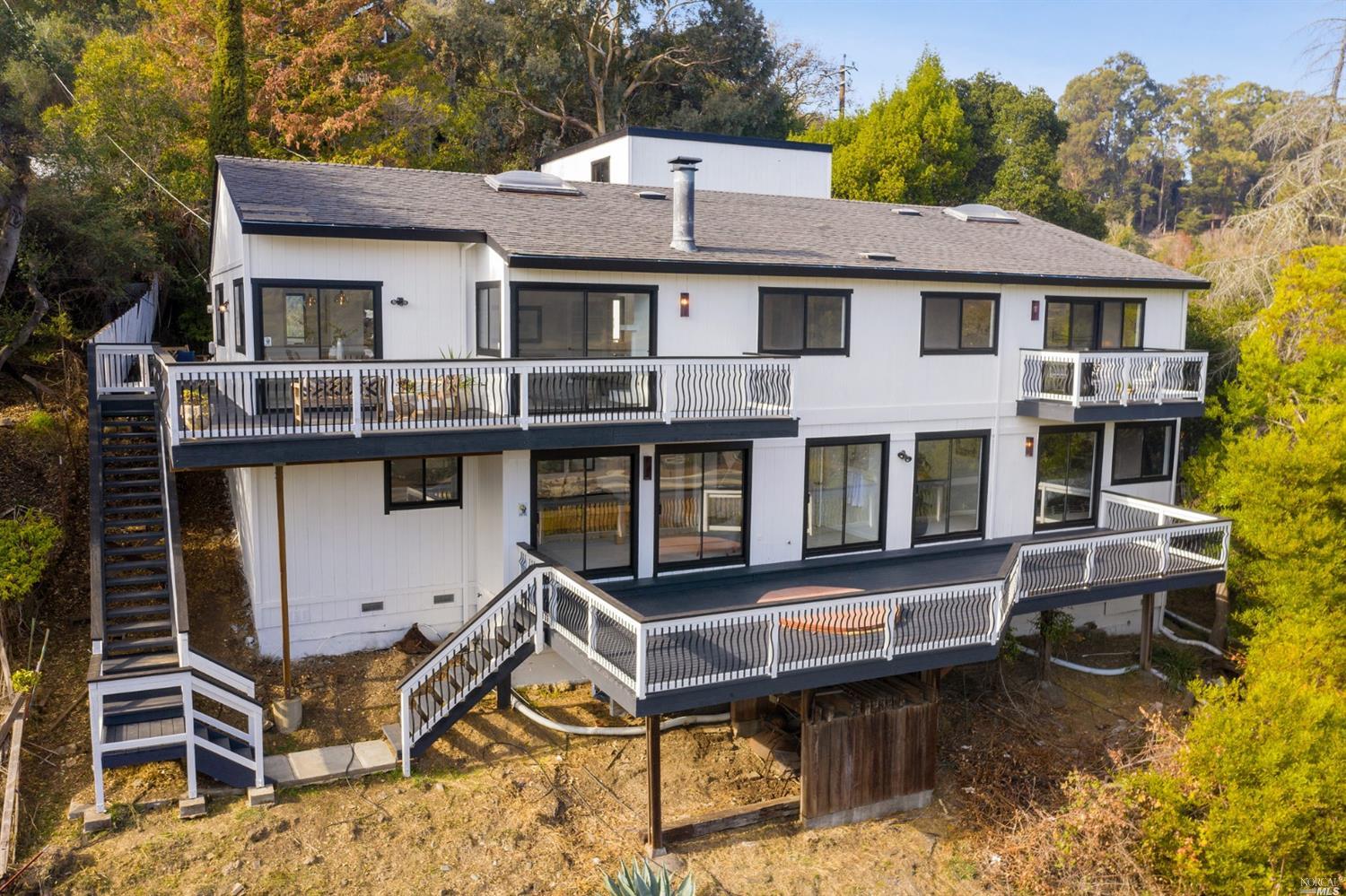 20 Fair Drive San Rafael, CA 94901 - Photo 1 of 1 a small swimming pool with a table and chairs