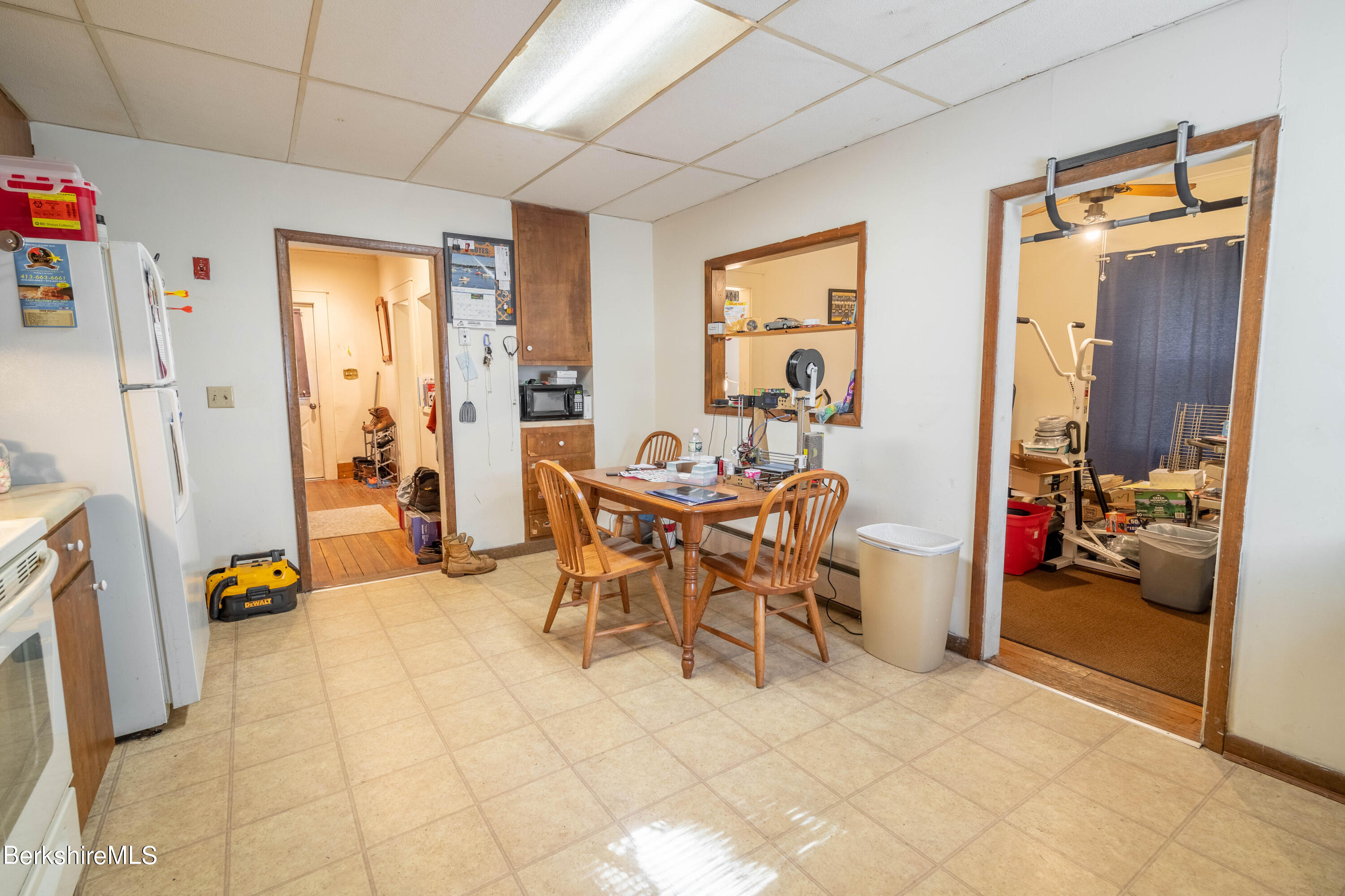 8-10 Gavin Avenue Adams, MA 01220 - Photo 13 of 19 a view of a dining room with furniture and a livingroom