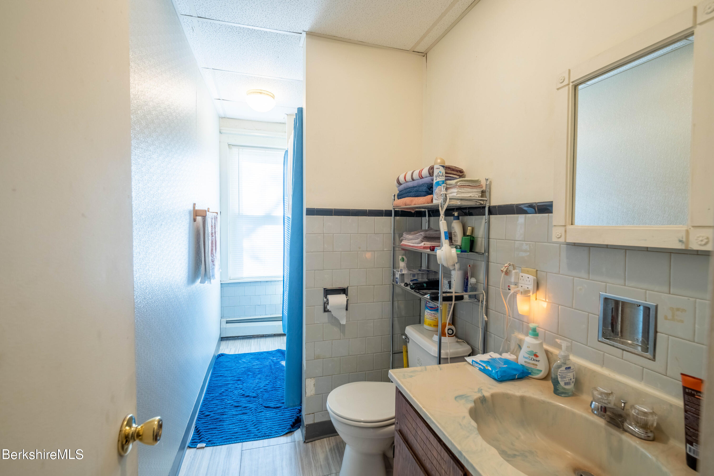 8-10 Gavin Avenue Adams, MA 01220 - Photo 19 of 19 a bathroom with a sink toilet and shower