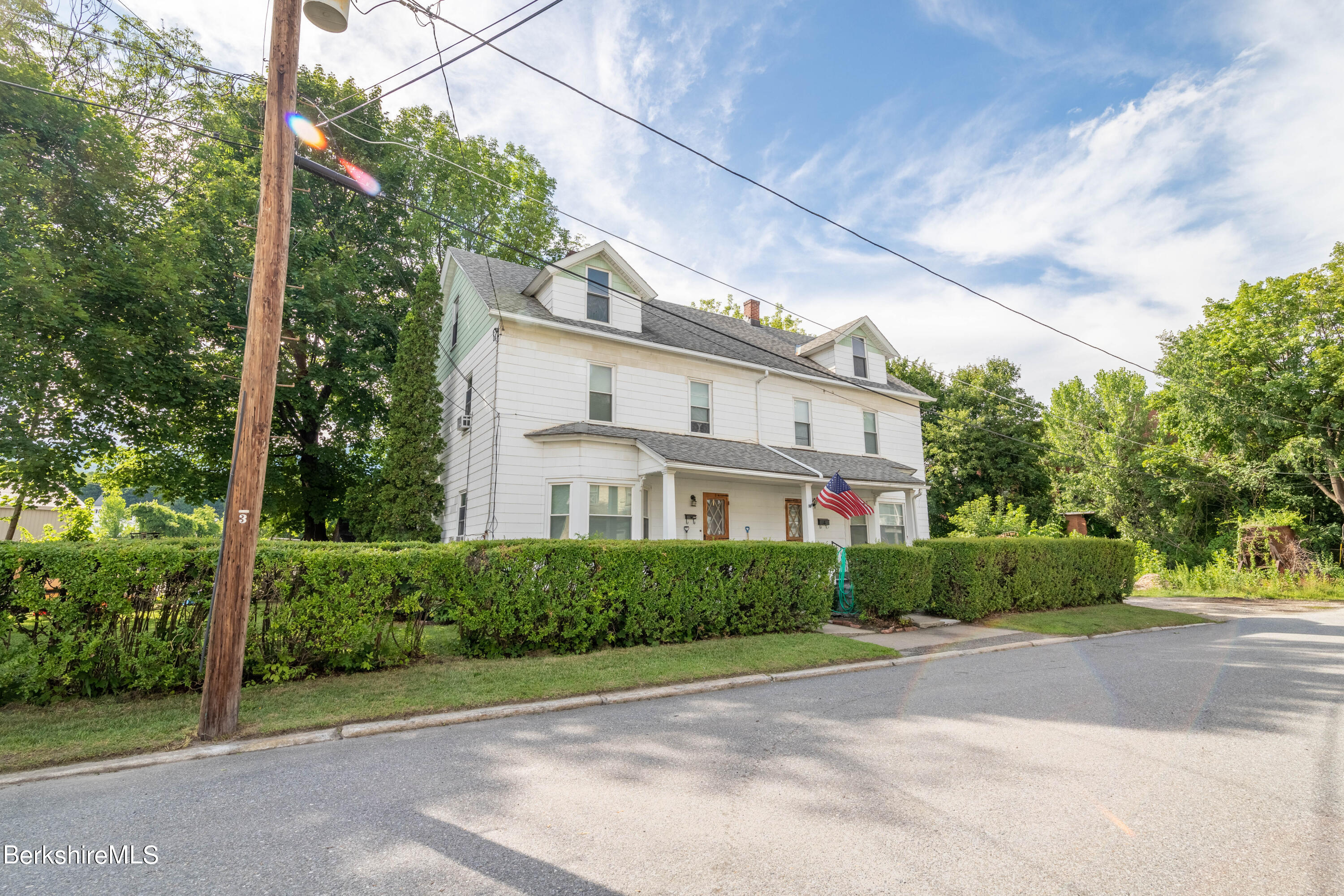 8-10 Gavin Avenue Adams, MA 01220 - Photo 3 of 19 a view of a house with a street