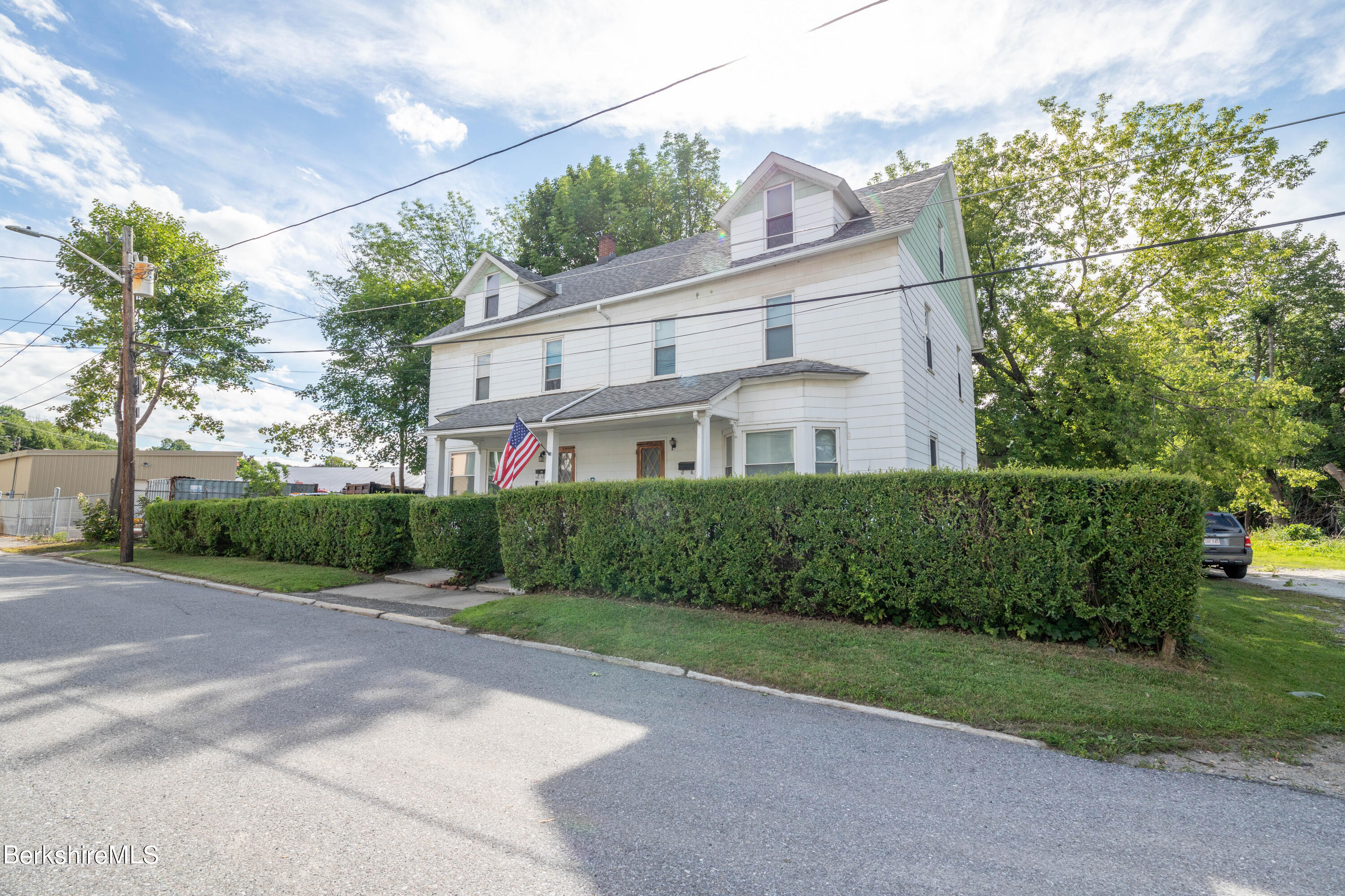 8-10 Gavin Avenue Adams, MA 01220 - Photo 4 of 19 a front view of house with yard and green space