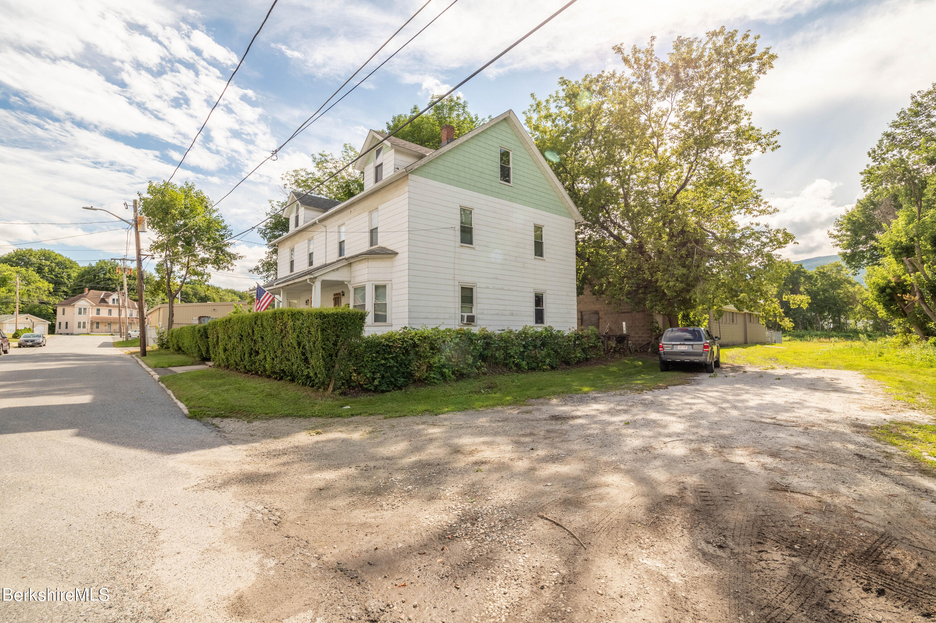 8-10 Gavin Avenue Adams, MA 01220 - Photo 5 of 19 a view of a house with backyard and trees