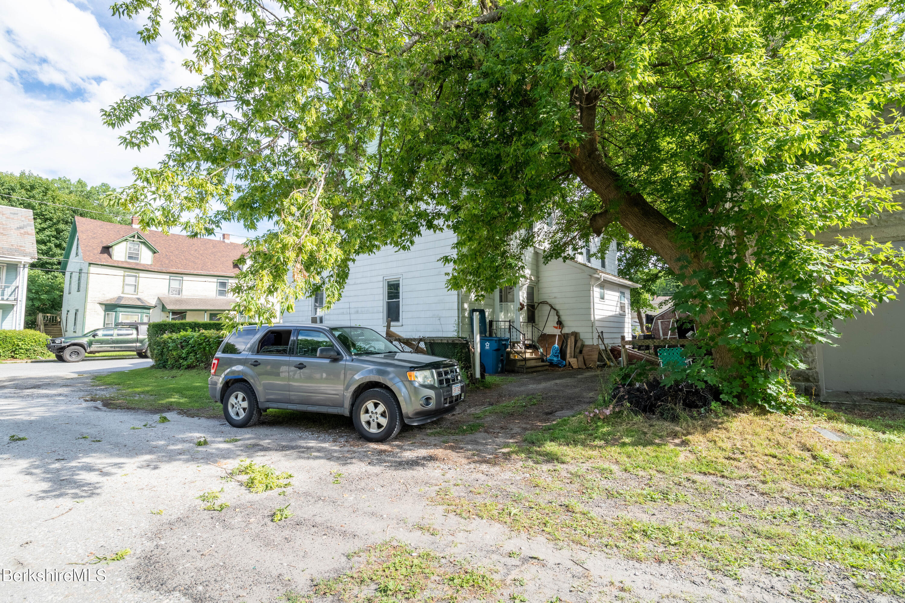 8-10 Gavin Avenue Adams, MA 01220 - Photo 6 of 19 a car parked in front of a house