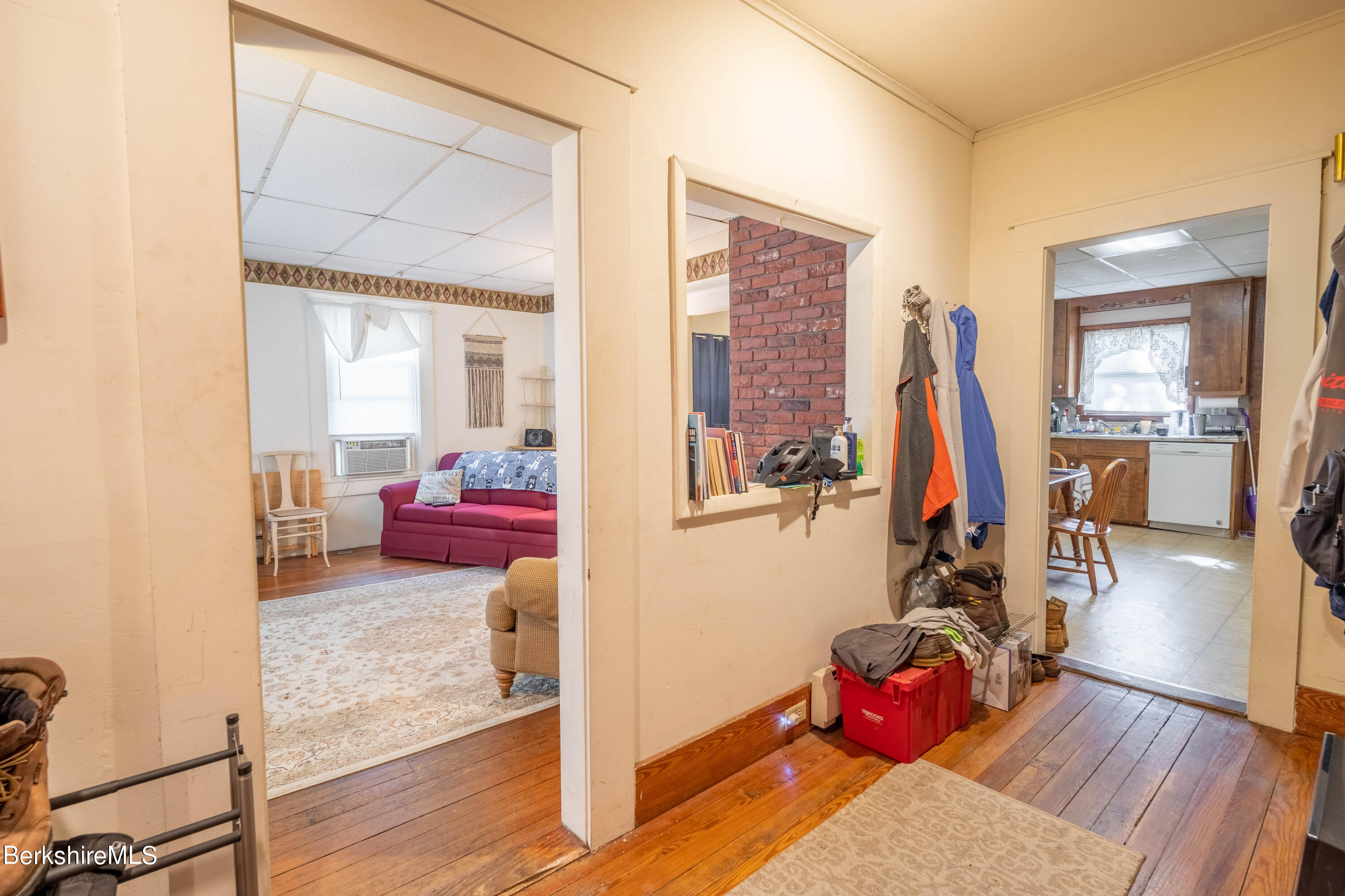 8-10 Gavin Avenue Adams, MA 01220 - Photo 8 of 19 a living room with furniture a flat screen tv and a wooden floor