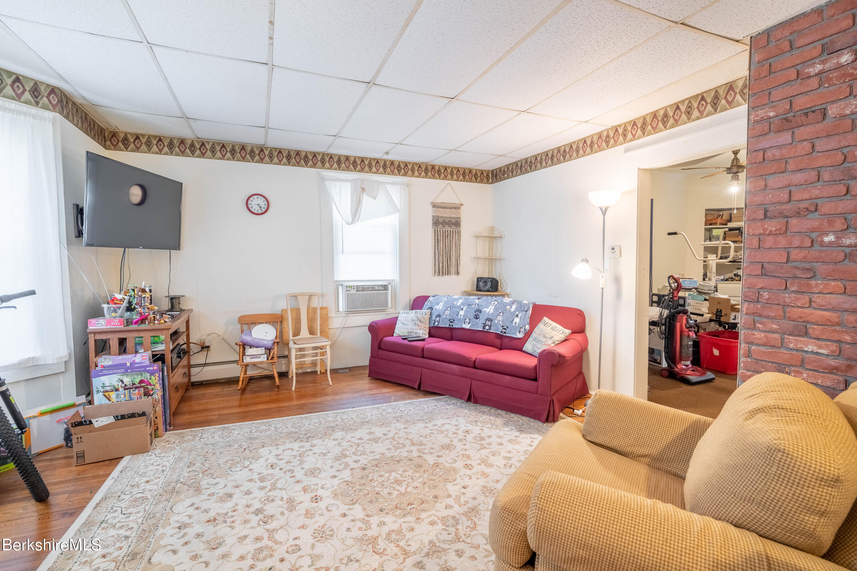 8-10 Gavin Avenue Adams, MA 01220 - Photo 9 of 19 a living room with furniture and a flat screen tv