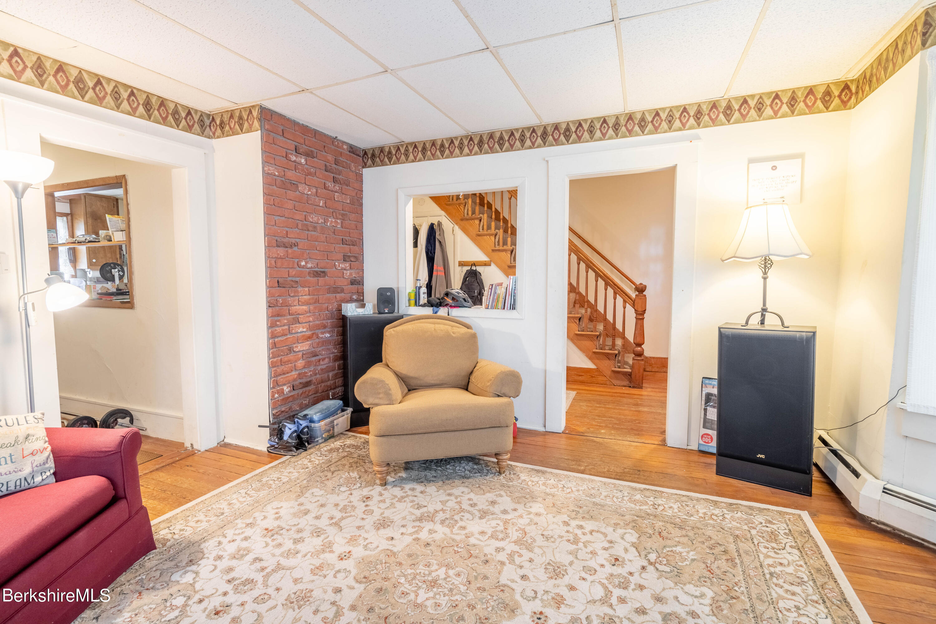 8-10 Gavin Avenue Adams, MA 01220 - Photo 10 of 19 a living room with furniture and a rug