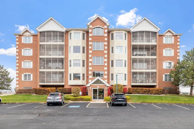 a car parked in front of a brick building