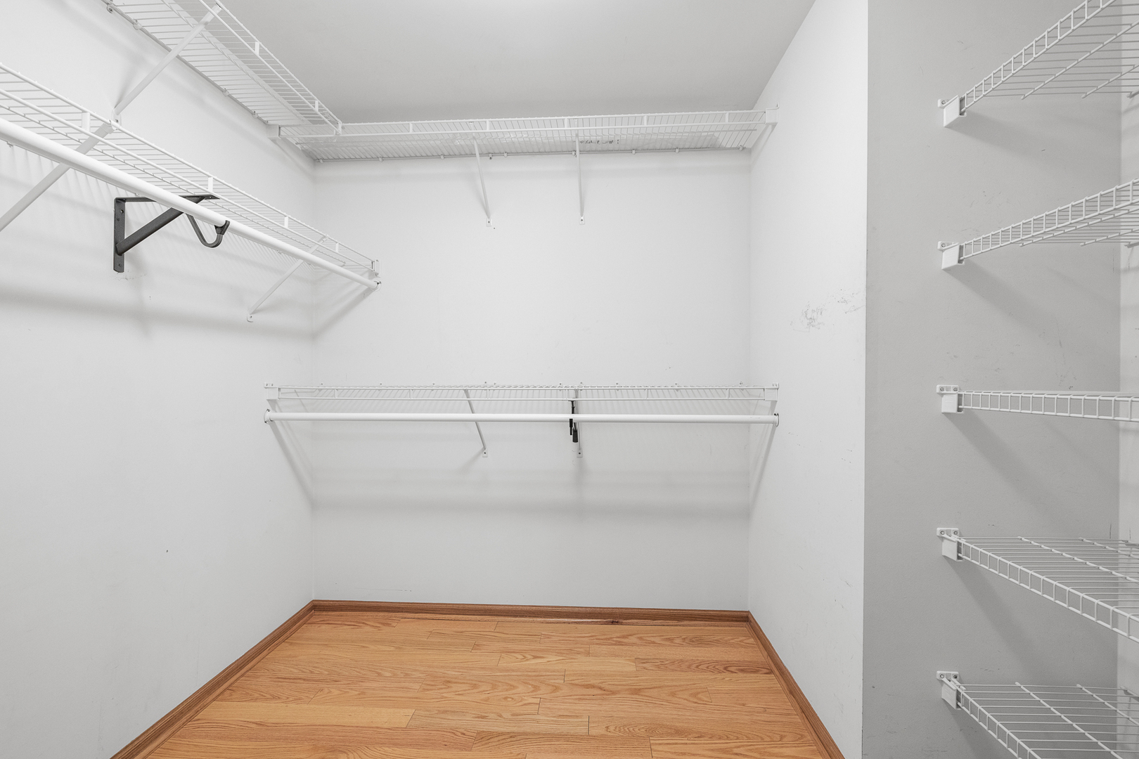 7912 Trinity Circle, Unit 1NW Tinley Park, IL 60487 - Photo 12 of 20 a view of a room with racks on the wall