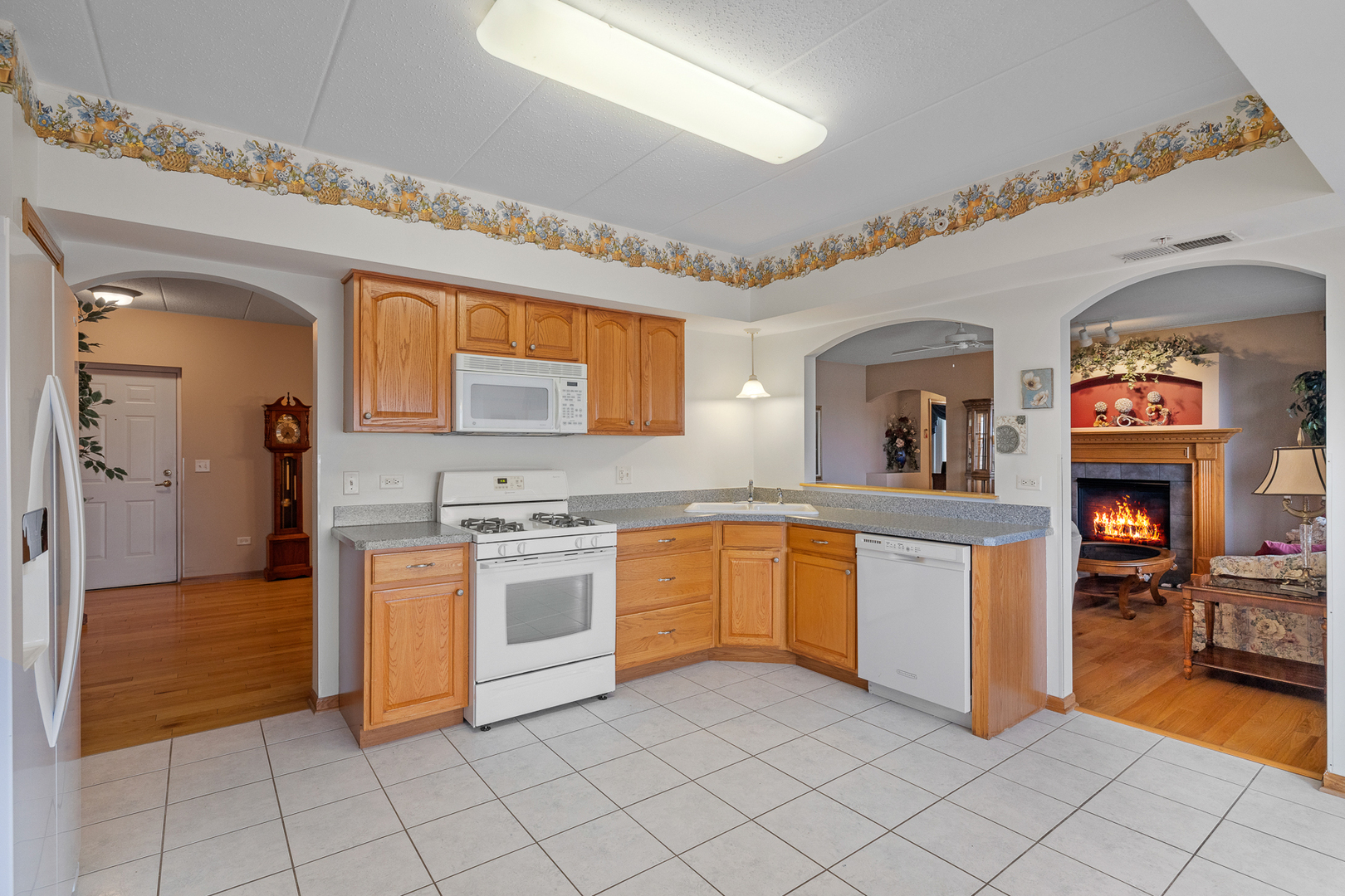 7912 Trinity Circle, Unit 1NW Tinley Park, IL 60487 - Photo 7 of 20 a kitchen with sink and cabinets