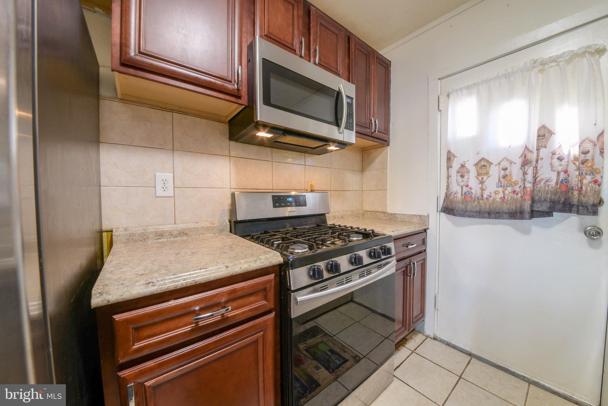 7730 Oxman Road Landover, MD 20785 - Photo 7 of 16 Granite Countertops, Upgraded Cabinets