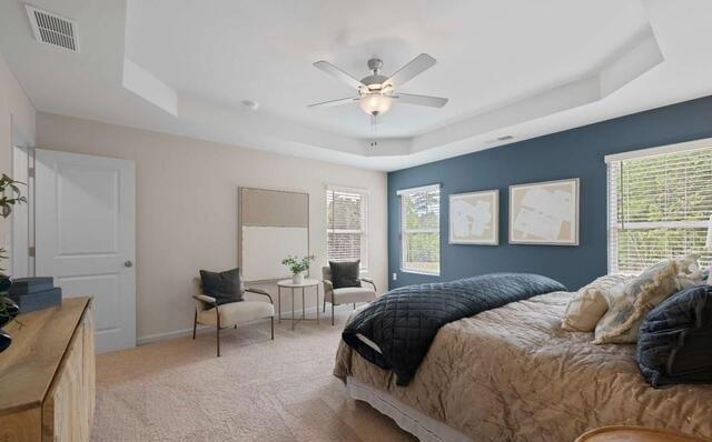 1290 Harmony Rdg Court Jonesboro, GA 30238 - Photo 18 of 29 a bedroom with a bed and a chandelier