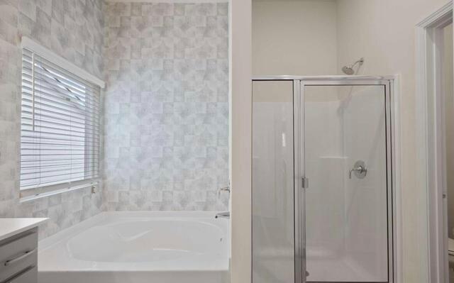 1290 Harmony Rdg Court Jonesboro, GA 30238 - Photo 21 of 29 a bathroom with a bathtub