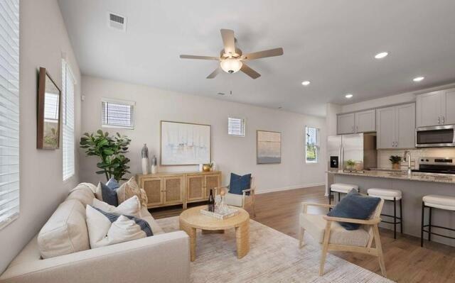 1290 Harmony Rdg Court Jonesboro, GA 30238 - Photo 10 of 29 a living room with furniture and a large window