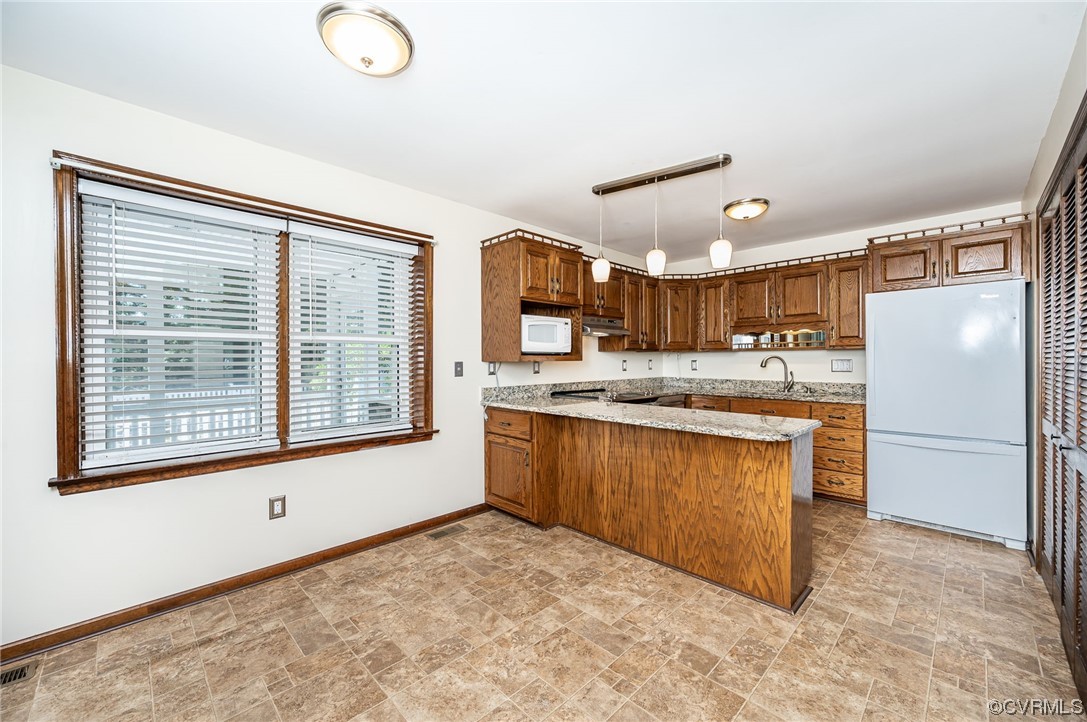3741 Harrow Drive Chester, VA 23831 - Photo 11 of 37 a kitchen with stainless steel appliances granite countertop a refrigerator and a stove top oven