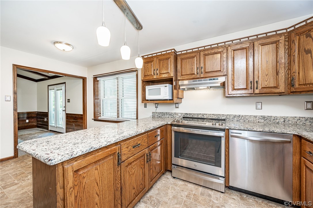 3741 Harrow Drive Chester, VA 23831 - Photo 13 of 37 a kitchen with stainless steel appliances granite countertop a stove and cabinets