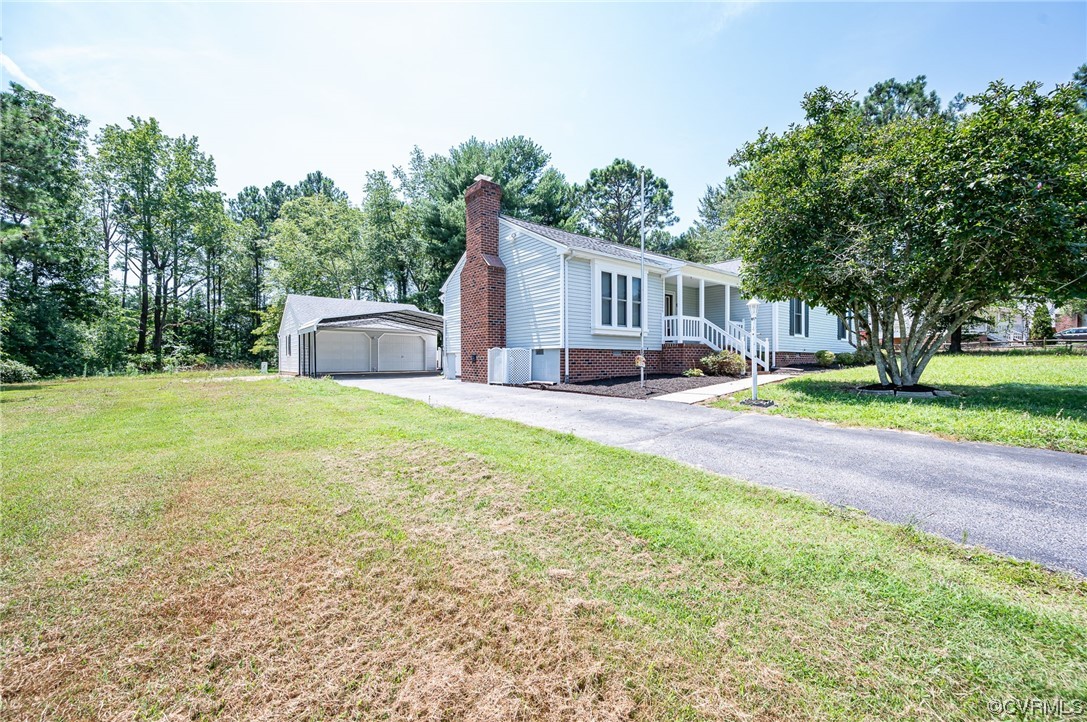 3741 Harrow Drive Chester, VA 23831 - Photo 2 of 37 a view of a house with a yard and sitting area