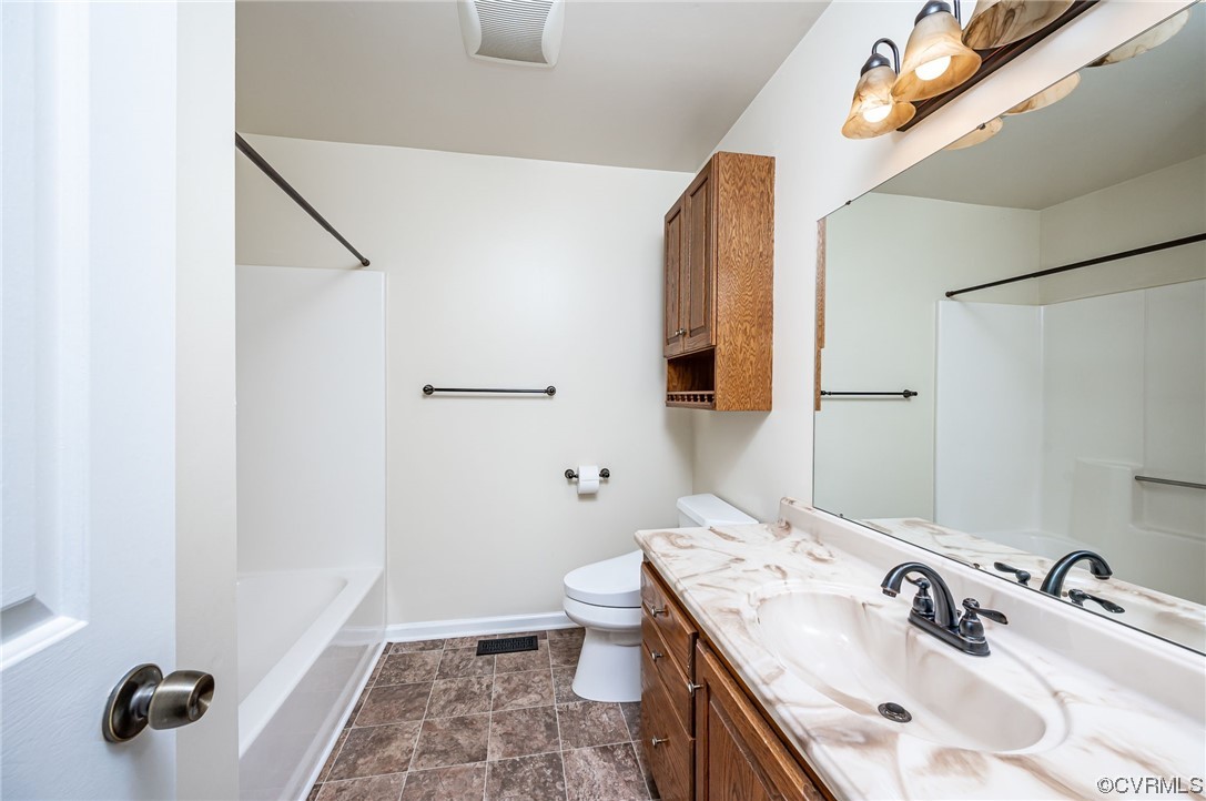 3741 Harrow Drive Chester, VA 23831 - Photo 24 of 37 a bathroom with a sink toilet and shower