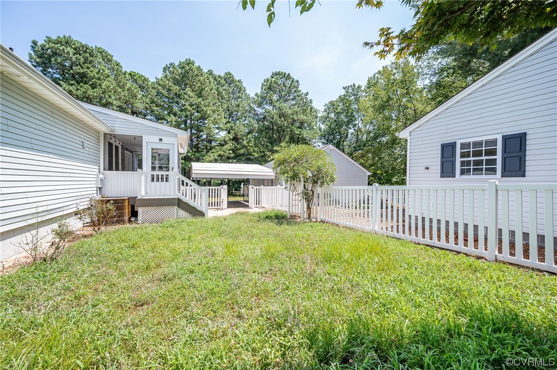 3741 Harrow Drive Chester, VA 23831 - Photo 29 of 37 a view of a house with backyard and a garden