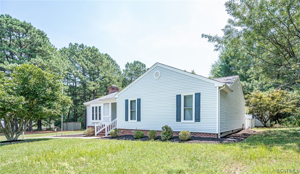 3741 Harrow Drive Chester, VA 23831 - Photo 3 of 37 a front view of house with yard and green space